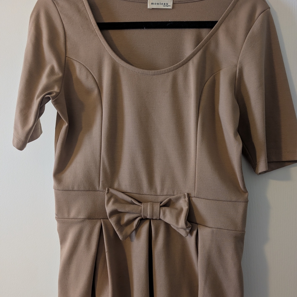Peplum Top With Bow Detail